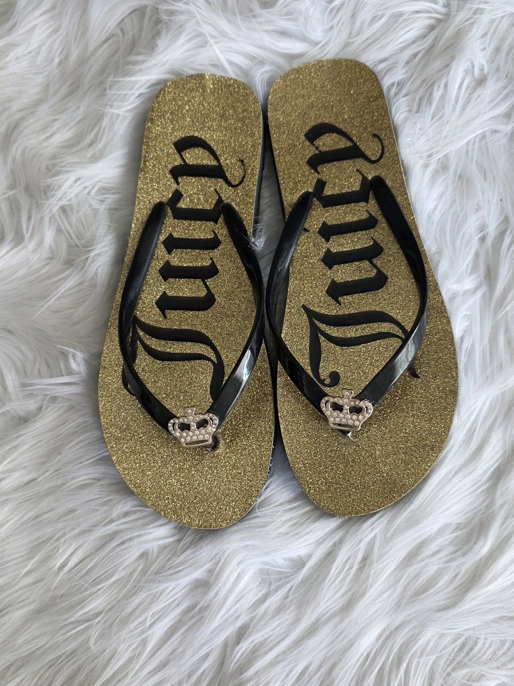 Juicy Couture Gold Glitter Flip Flops with Black Straps and Crown Accent